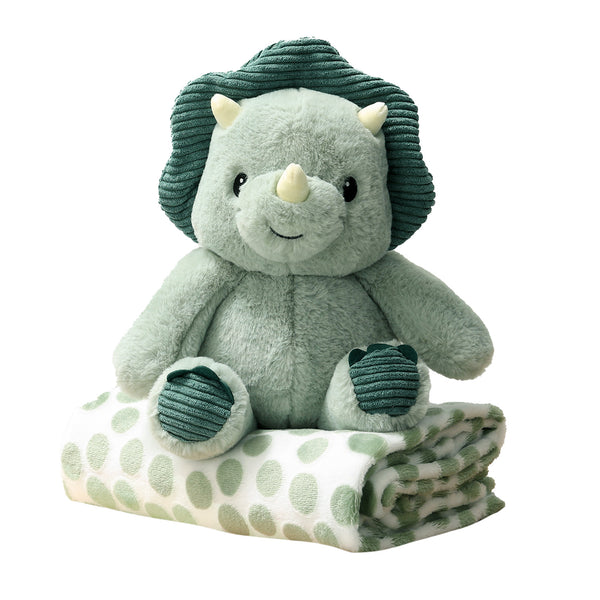 Green plush dinosaur toy with a matching blanket on a white background