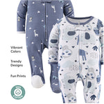 two baby onesies with different animal print patterns, including giraffes, zebras, and elephants. The onesie on the left has a blue and white color scheme, while the one on the right has a white and blue color scheme. The onesie on the right also has a zipper closure.