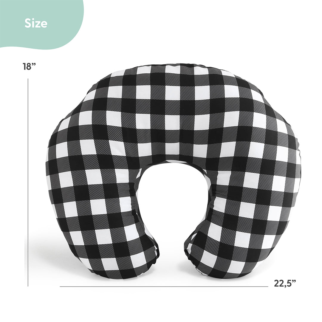 a black and white checkered pillow or cushion, with a measurement scale indicating its size.